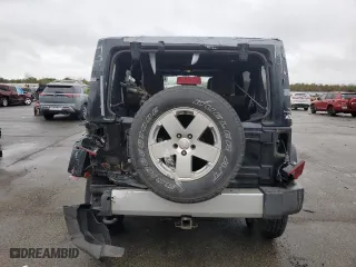 2012 Jeep Wrangler Unlimited Sahara with VIN 1C4HJWEG0CL163310, listed as a Copart auction lot 48972825 with 125,934 mi miles and Salvage Title. Bid and sale history available at carsss.com. Image 6.