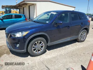 2014 Mazda CX-5 Touring with VIN JM3KE2CY7E0362879, listed as a Copart auction lot 53079545 with 70,863 mi miles and Salvage Title. Bid and sale history available at carsss.com. Image 1.