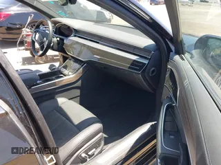 2024 Audi A8 with VIN WAULDAF89RN003075, listed as a IAAI auction lot 42502959 with 4,409 mi miles and . Bid and sale history available at DreamBid. Image 5.