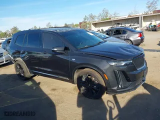 2020 Cadillac XT6 AWD Sport with VIN 1GYKPGRS1LZ170931, listed as a IAAI auction lot 40656458 with 80,168 mi miles. Bid and sale history available at carsss.com. Image 1.