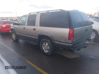 1999 GMC Suburban with VIN 1GKFK16R4XJ799354, listed as a IAAI auction lot 41696999 with 269,606 mi miles. Bid and sale history available at carsss.com. Image 3.
