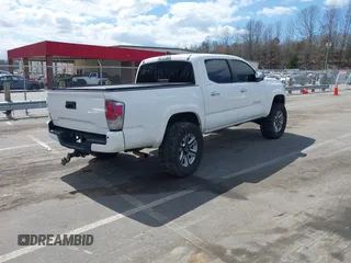 2018 Toyota Tacoma SR with VIN 3TMGZ5AN1JM150189, listed as a IAAI auction lot 41814119 with 109,014 mi miles. Bid and sale history available at carsss.com. Image 4.