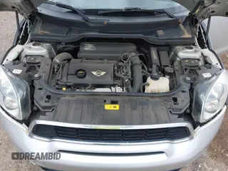 2011 MINI Countryman S with VIN WMWZC5C51BWM10385, listed as a IAAI auction lot 41952679 with 112,008 mi miles and . Bid and sale history available at DreamBid. Image 10.