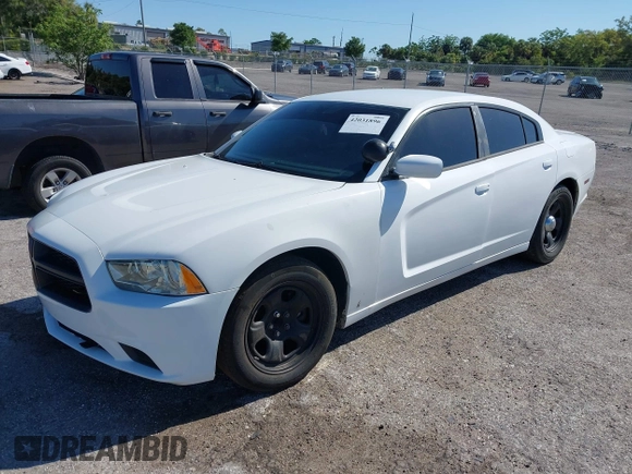 2012 Dodge Charger Police with VIN 2C3CDXAG7CH172472, listed as a IAAI auction lot 42031896 with 196,887 mi miles. Bid and sale history available at carsss.com. Image 2.
