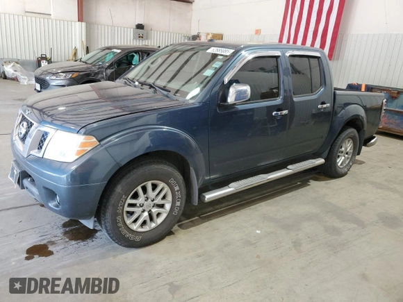 2014 Nissan Frontier SV with VIN 1N6AD0ER1EN770604, listed as a Copart auction lot 52885885 with 130,971 mi miles and Salvage Title. Bid and sale history available at DreamBid. Image 1.