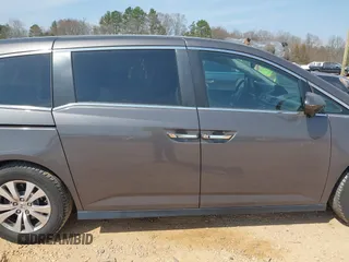 2016 Honda Odyssey EX-L with VIN 5FNRL5H61GB099699, listed as a IAAI auction lot 41807964 with 67,041 mi miles and . Bid and sale history available at DreamBid. Image 13.