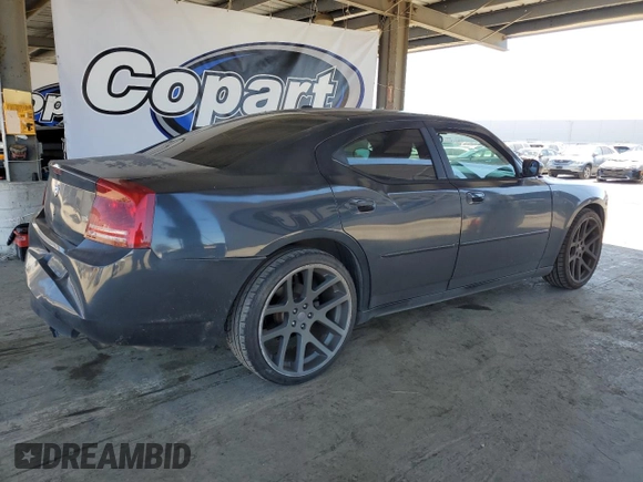 2007 Dodge Charger z VIN 2B3KA43G27H864237, wystawiony jako Copart lot #56039375 z przebiegiem 172 236 mil mil oraz Czysty tytuł • Clean title. Historia ofert i sprzedaży dostępna na DreamBid. Obrazek 3.
