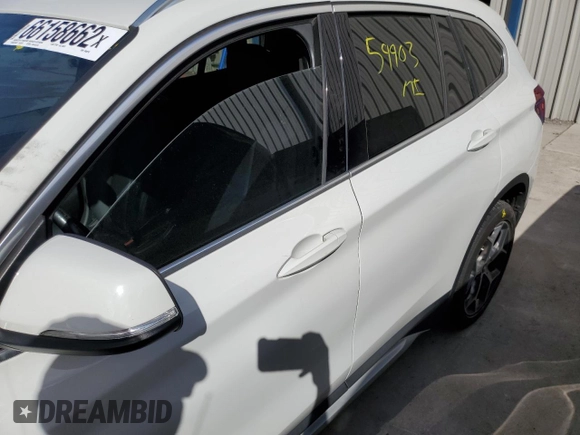 2018 BMW X1 sDrive28i with VIN WBXHU7C38J5H40248, listed as a Copart auction lot 66158662 with 59,903 mi miles. Bid and sale history available at carsss.com. Image 9.
