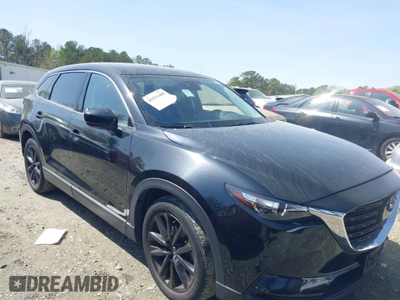 2023 Mazda CX-9 Touring Plus with VIN JM3TCBAY9P0657854, listed as a IAAI auction lot 41931409 with 54,036 mi miles and . Bid and sale history available at DreamBid. Image 1.