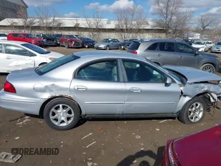 2000 Mercury Sable LS Premium with VIN 1MEFM55S3YG647919, listed as a IAAI auction lot 41677265 with 131,528 mi miles. Bid and sale history available at carsss.com. Image 13.