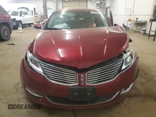 2015 Lincoln MKZ z VIN 3LN6L2J92FR624638, wystawiony jako Copart lot #57158245 z przebiegiem 150 045 mil mil oraz Szkoda całkowita • Salvage title. Historia ofert i sprzedaży dostępna na DreamBid. Obrazek 5.
