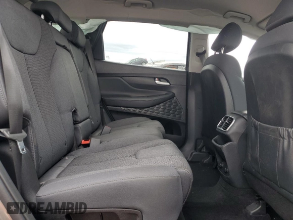 2019 Hyundai Santa Fe SE z VIN 5NMS2CAD0KH123337, wystawiony jako Copart lot #53883405 z przebiegiem 79 456 mil mil oraz Szkoda całkowita • Salvage title. Historia ofert i sprzedaży dostępna na DreamBid. Obrazek 11.