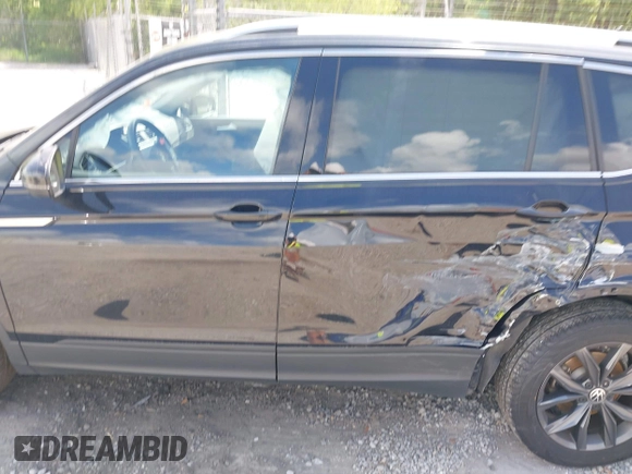 2024 Volkswagen Tiguan SE with VIN 3VV3B7AX7RM029891, listed as a IAAI auction lot 42087357 with 43,636 mi miles and . Bid and sale history available at DreamBid. Image 14.