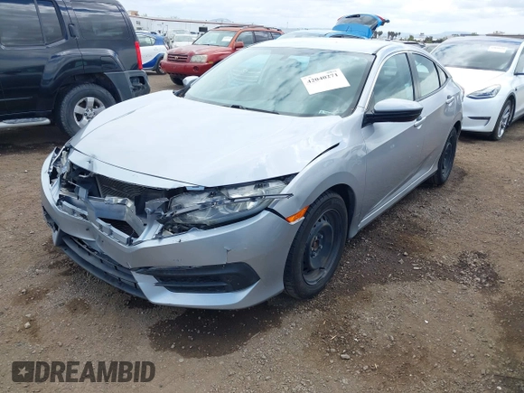 2018 Honda Civic LX with VIN 2HGFC2F50JH500559, listed as a IAAI auction lot 42040271 with 82,026 mi miles and . Bid and sale history available at DreamBid. Image 2.