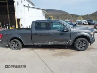 2015 Ford F-150 XLT with VIN 1FTFW1EF9FFA38148, listed as a IAAI auction lot 42069434 with 260,329 mi miles and . Bid and sale history available at DreamBid. Image 13.