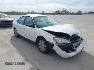 2002 Ford Taurus LX Standard with VIN 1FAFP52U62A140351, listed as a IAAI auction lot 40639709 with 154,334 mi miles and . Bid and sale history available at DreamBid. Image 1.