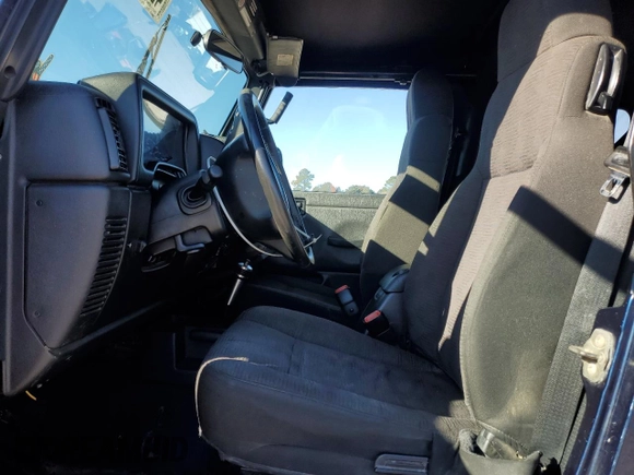 2005 Jeep Wrangler Sport with VIN 1J4FA49S85P300851, listed as a Copart auction lot 42197705 with 126,322 mi miles and Salvage Title. Bid and sale history available at carsss.com. Image 7.