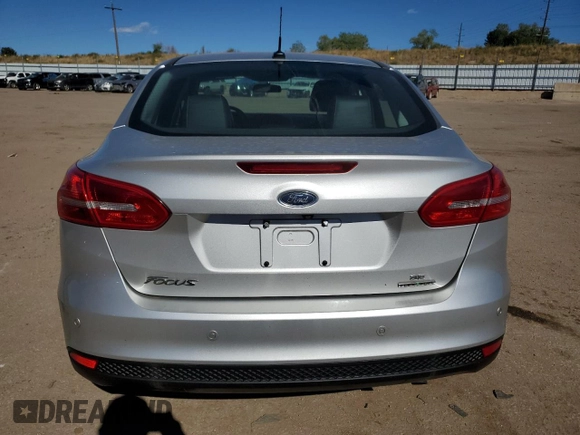 2016 Ford Focus SE with VIN 1FADP3F29GL314719, listed as a Copart auction lot 77686334 with 76,515 mi miles and Salvage title. Bid and sale history available at DreamBid. Image 6.