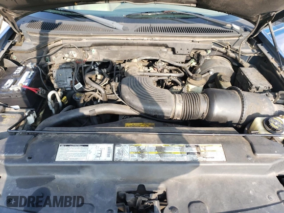 2000 Ford Expedition Eddie Bauer with VIN 1FMRU17L1YLC39371, listed as a Copart auction lot 53982495 with 220,391 mi miles and Salvage title. Bid and sale history available at DreamBid. Image 12.