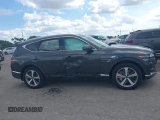 2024 Genesis GV80 with VIN KMUHCESC7RU155291, listed as a IAAI auction lot 41544670 with 10,899 mi miles and . Bid and sale history available at DreamBid. Image 12.
