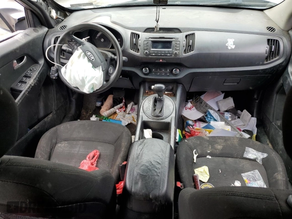 2012 Kia Sportage LX z VIN KNDPB3A20C7217165, wystawiony jako Copart lot #60999525 z przebiegiem 128 231 mil mil oraz Szkoda całkowita • Salvage title. Historia ofert i sprzedaży dostępna na DreamBid. Obrazek 8.