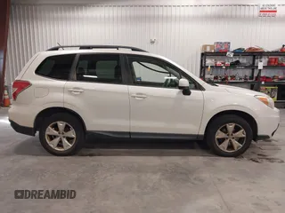 2014 Subaru Forester 2.5i Premium with VIN JF2SJAECXEH556132, listed as a IAAI auction lot 41915372 with 139,214 mi miles. Bid and sale history available at carsss.com. Image 13.