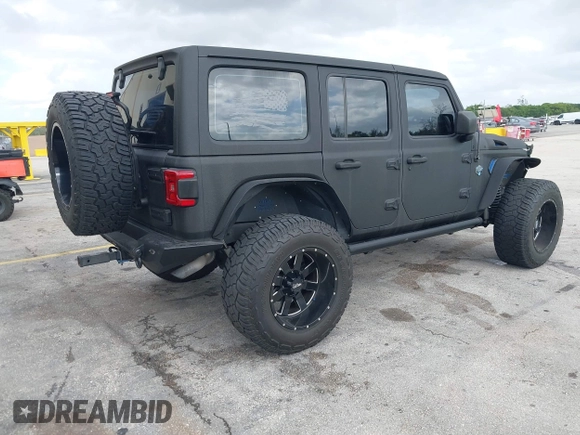 2018 Jeep Wrangler Unlimited Sport S z VIN 1C4HJXDG2JW228483, wystawiony jako IAAI lot #41710364 z przebiegiem 56 970 mil mil oraz . Historia ofert i sprzedaży dostępna na DreamBid. Obrazek 4.
