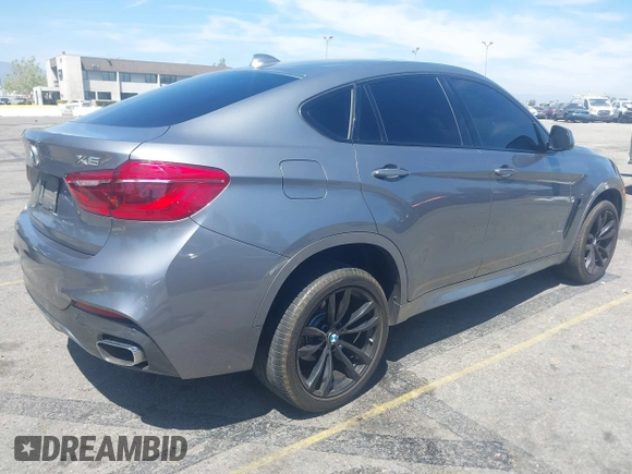 2018 BMW X6 xDrive35i z VIN 5UXKU2C51J0X50913, wystawiony jako IAAI lot #42078443 z przebiegiem Nie podano mil oraz . Historia ofert i sprzedaży dostępna na DreamBid. Obrazek 4.