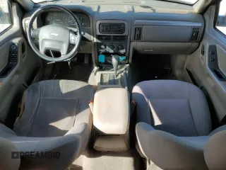 2002 Jeep Grand Cherokee with VIN 1J4GX38S82C178199, listed as a Copart auction lot 48996515 with 299,780 mi miles and Salvage title. Bid and sale history available at DreamBid. Image 8.