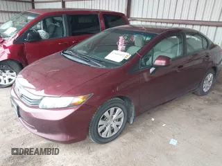 2012 Honda Civic LX z VIN 2HGFB2F50CH596442, wystawiony jako IAAI lot #42160402 z przebiegiem 130 152 mil mil oraz . Historia ofert i sprzedaży dostępna na DreamBid. Obrazek 17.