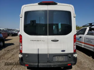 2019 Ford Transit with VIN 1FTYR2CM2KKB66496, listed as a Copart auction lot 87134004 with 190,590 mi miles and Salvage title. Bid and sale history available at DreamBid. Image 6.