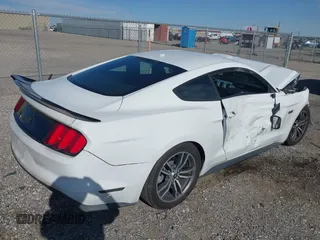 2015 Ford Mustang EcoBoost with VIN 1FA6P8TH8F5306709, listed as a IAAI auction lot 41880999 with 89,492 mi miles and . Bid and sale history available at carsss.com. Image 4.