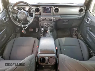 2021 Jeep Gladiator Freedom with VIN 1C6HJTAG8ML580882, listed as a Copart auction lot 57690885 with Not provided miles and Salvage title. Bid and sale history available at DreamBid. Image 8.