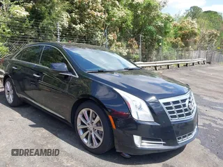 2013 Cadillac XTS Luxury with VIN 2G61P5S33D9130356, listed as a IAAI auction lot 41948902 with 216,301 mi miles. Bid and sale history available at carsss.com. Image 1.