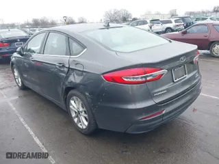 2019 Ford Fusion Hybrid SE with VIN 3FA6P0LU4KR119909, listed as a IAAI auction lot 41571270 with 125,446 mi miles. Bid and sale history available at carsss.com. Image 3.