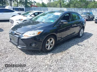 2013 Ford Focus SE with VIN 1FADP3F21DL180199, listed as a IAAI auction lot 42768802 with 125,095 mi miles and . Bid and sale history available at DreamBid. Image 2.