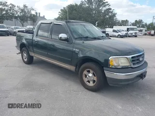 2002 Ford F-150 XLT with VIN 1FTRW07L32KE29226, listed as a IAAI auction lot 40842994 with 207,066 mi miles. Bid and sale history available at carsss.com. Image 1.