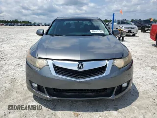 2009 Acura TSX z VIN JH4CU26699C031458, wystawiony jako Copart lot #60595125 z przebiegiem 188 954 mil mil oraz Czysty tytuł • Clean title. Historia ofert i sprzedaży dostępna na DreamBid. Obrazek 5.