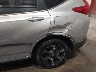 2017 Honda CR-V Touring with VIN 2HKRW2H90HH603307, listed as a IAAI auction lot 41868564 with 81,144 mi miles. Bid and sale history available at carsss.com. Image 17.
