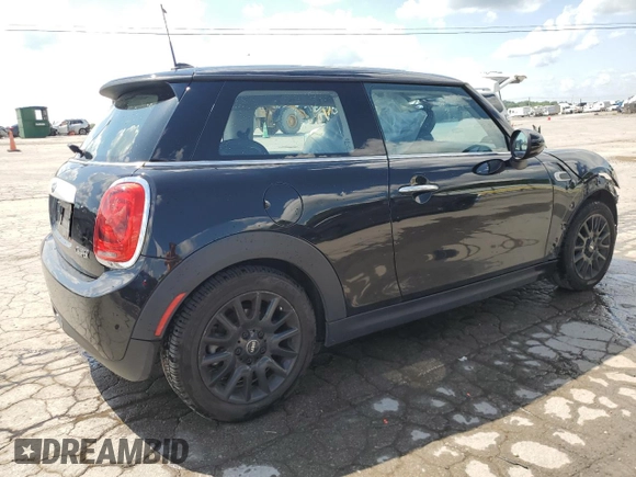 2015 MINI Hardtop with VIN WMWXM5C55F3A04740, listed as a Copart auction lot 61616655 with 95,108 mi miles and Salvage title. Bid and sale history available at DreamBid. Image 3.