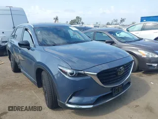 2021 Mazda CX-9 Carbon Edition with VIN JM3TCBDY0M0526352, listed as a IAAI auction lot 42403901 with 50,193 mi miles and . Bid and sale history available at DreamBid. Image 1.
