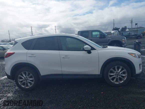 2015 Mazda CX-5 Grand Touring with VIN JM3KE4DY0F0483037, listed as a IAAI auction lot 41578222 with 102,988 mi miles. Bid and sale history available at carsss.com. Image 13.