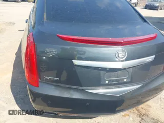 2013 Cadillac XTS Luxury z VIN 2G61P5S37D9110658, wystawiony jako IAAI lot #42196442 z przebiegiem 182 228 mil mil oraz . Historia ofert i sprzedaży dostępna na DreamBid. Obrazek 17.