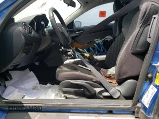 2005 Mazda RX-8 with VIN JM1FE173450144529, listed as a Copart auction lot 56769284 with 0 mi miles and Salvage Title. Bid and sale history available at carsss.com. Image 7.