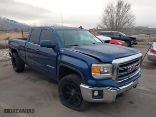 2015 GMC Sierra 1500 SLE with VIN 1GTV2UEC3FZ224734, listed as a IAAI auction lot 41549283 with 153,287 mi miles. Bid and sale history available at carsss.com. Image 1.