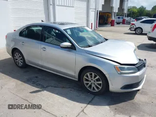 2012 Volkswagen Jetta Sedan SE w/Convenience with VIN 3VWDX7AJ1CM401939, listed as a IAAI auction lot 41941070 with 123,611 mi miles. Bid and sale history available at carsss.com. Image 1.