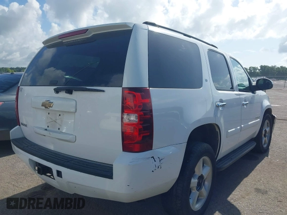2007 Chevrolet Tahoe LT with VIN 1GNFC13J97R314853, listed as a IAAI auction lot 42684980 with 312,399 mi miles and . Bid and sale history available at DreamBid. Image 4.