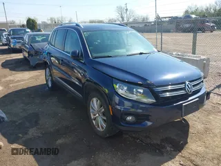2012 Volkswagen Tiguan S with VIN WVGBV7AX2CW566981, listed as a IAAI auction lot 42069748 with 153,613 mi miles and . Bid and sale history available at DreamBid. Image 1.