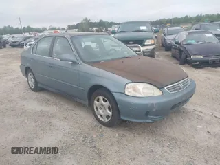 2000 Honda Civic EX with VIN 2HGEJ8648YH601225, listed as a IAAI auction lot 41945291 with 112,853 mi miles. Bid and sale history available at carsss.com. Image 1.