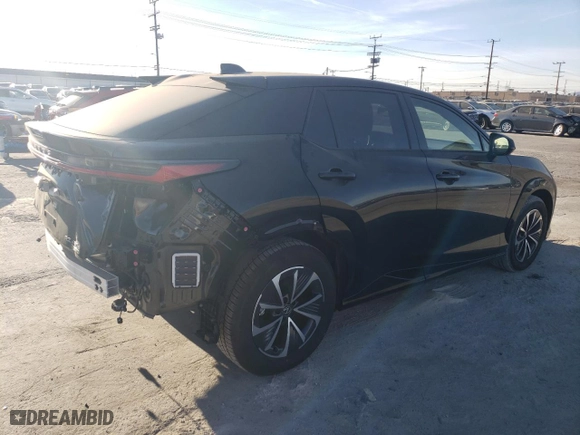2023 Lexus RZ with VIN JTJAAAAB9PA007621, listed as a Copart auction lot 80594143 with 7,673 mi miles and Salvage Title. Bid and sale history available at carsss.com. Image 3.